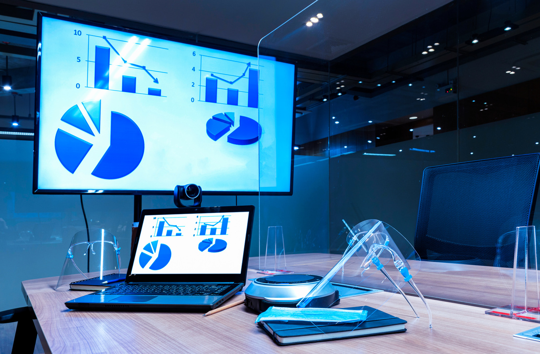 Mock up chart diagram presentation on display laptop and television in meeting room